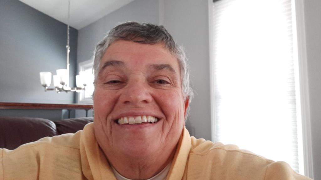 Victoria Picone in a yellow sweatshirt