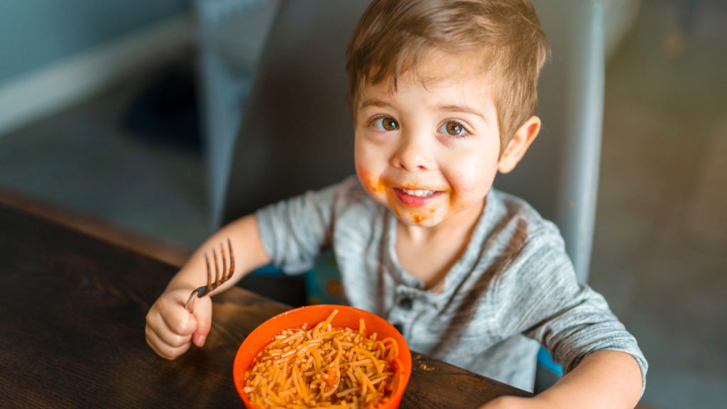 Child eating spaghetti