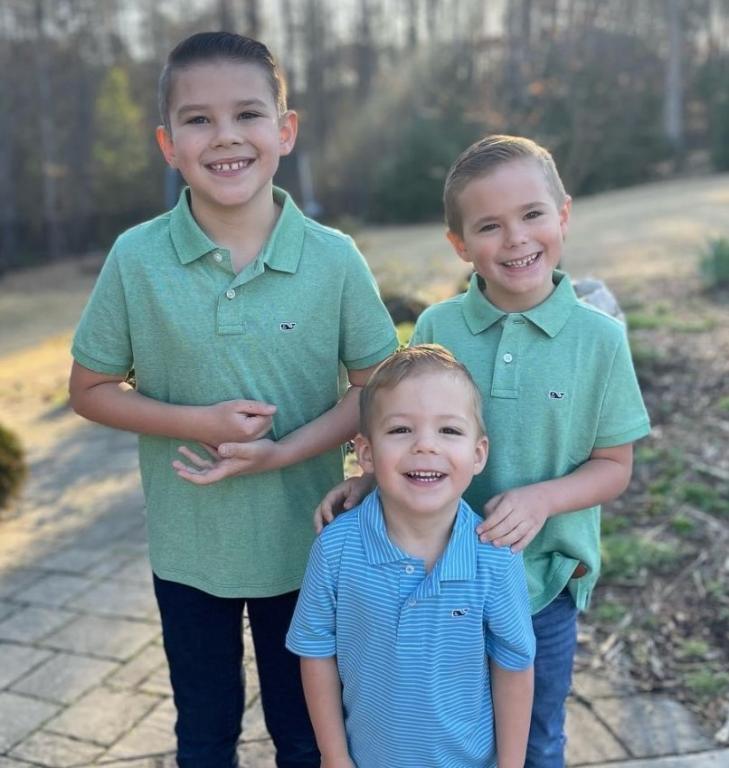 Coleman brothers three pose in polo shirts