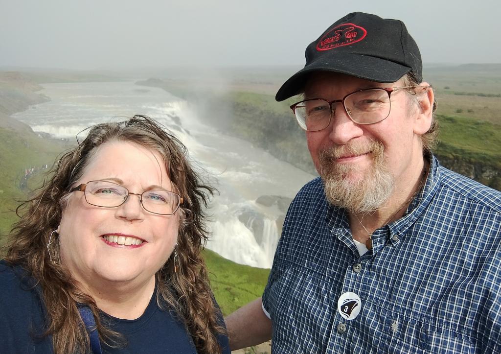 Donna Hawkins and husband near waterfall