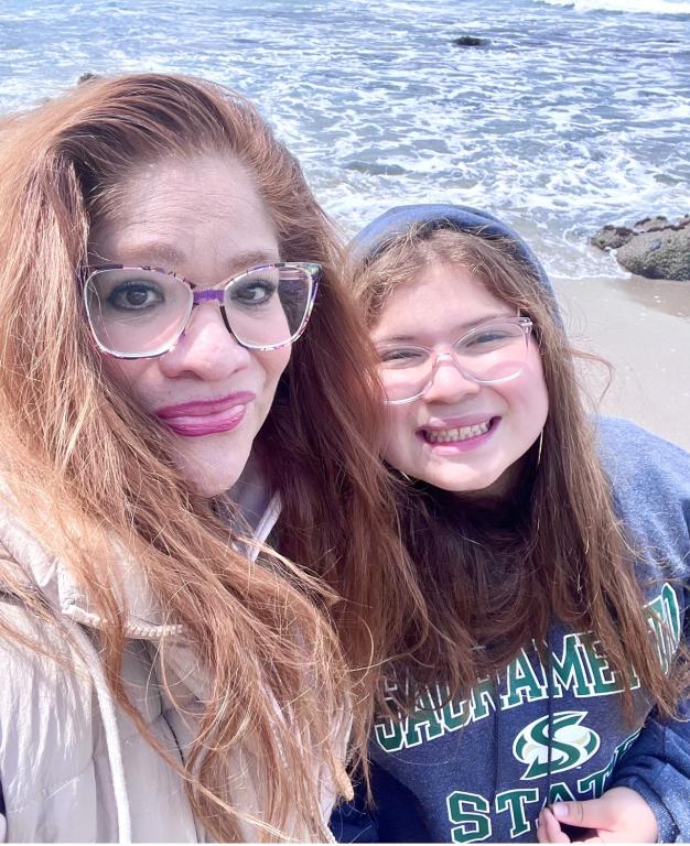 Laura Zamora and her daughter at beach