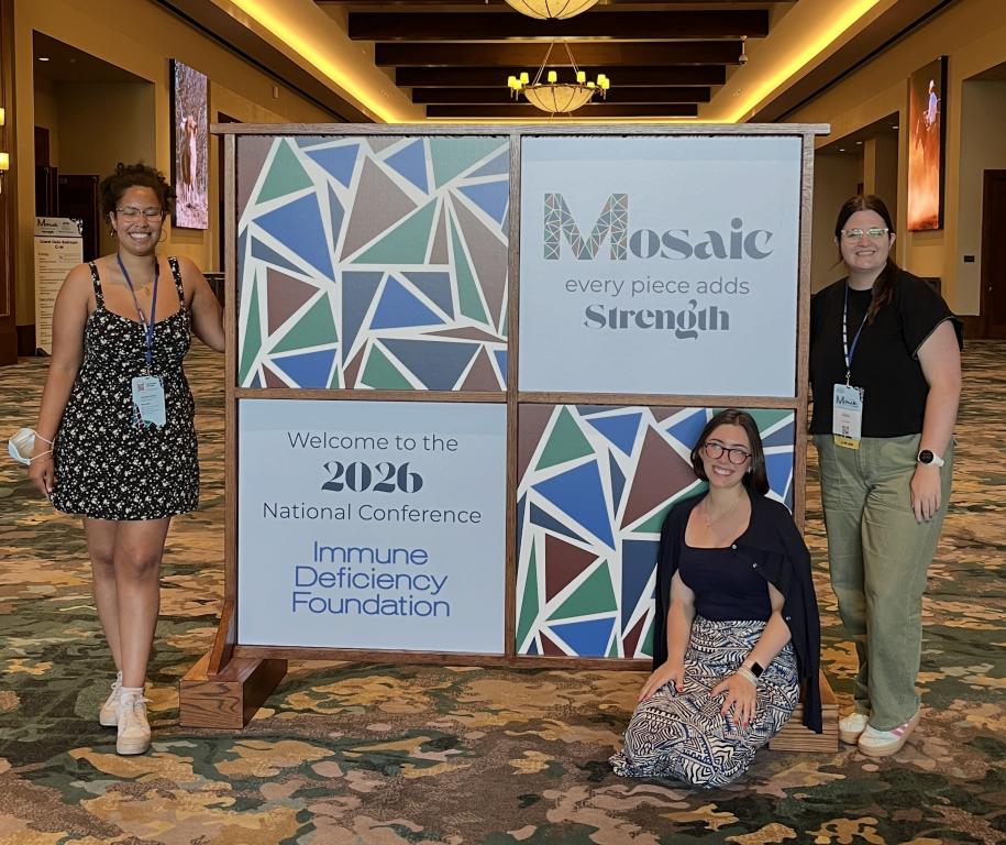 Madison Dresler stands with two friends at the national conference