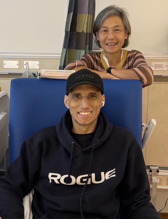 Chris Simpson with NIH researcher Dr. Suk See De Ravin