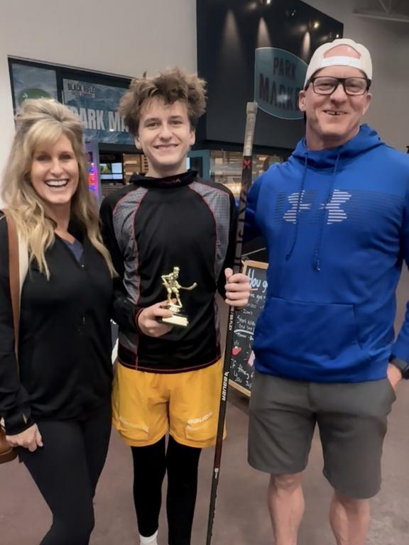 Stacy Ahearn with her son and husband
