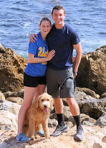 Bryce Powerman, his wife Kate and their dog at the beach.