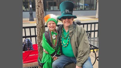 Tom Gagen and grandson at a St Patricks day parade