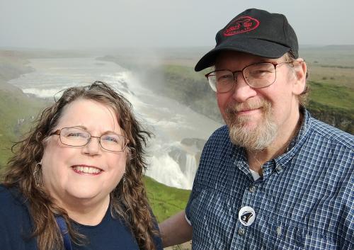 Donna Hawkins and husband near waterfall