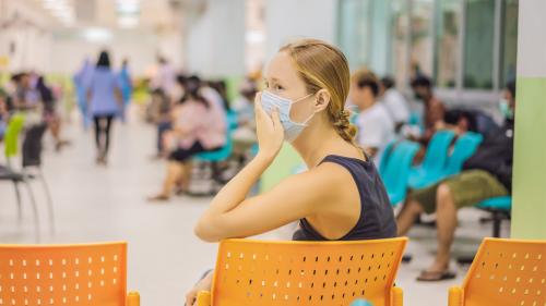 woman with mask in er