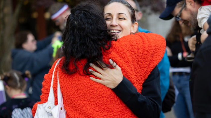 Two women hugging